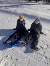 Crystal-Harderson-two-children-with-sled