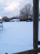 Laura-Chris-Woodward-Sewell-snowy-yard-at-Hunt