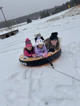 Melissa-Hardcastle-kiddos-tubing-in-snow-Hagarville