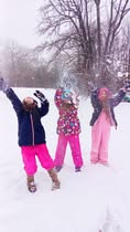 Tierra-Estes-pink-jackets-throwing-snow